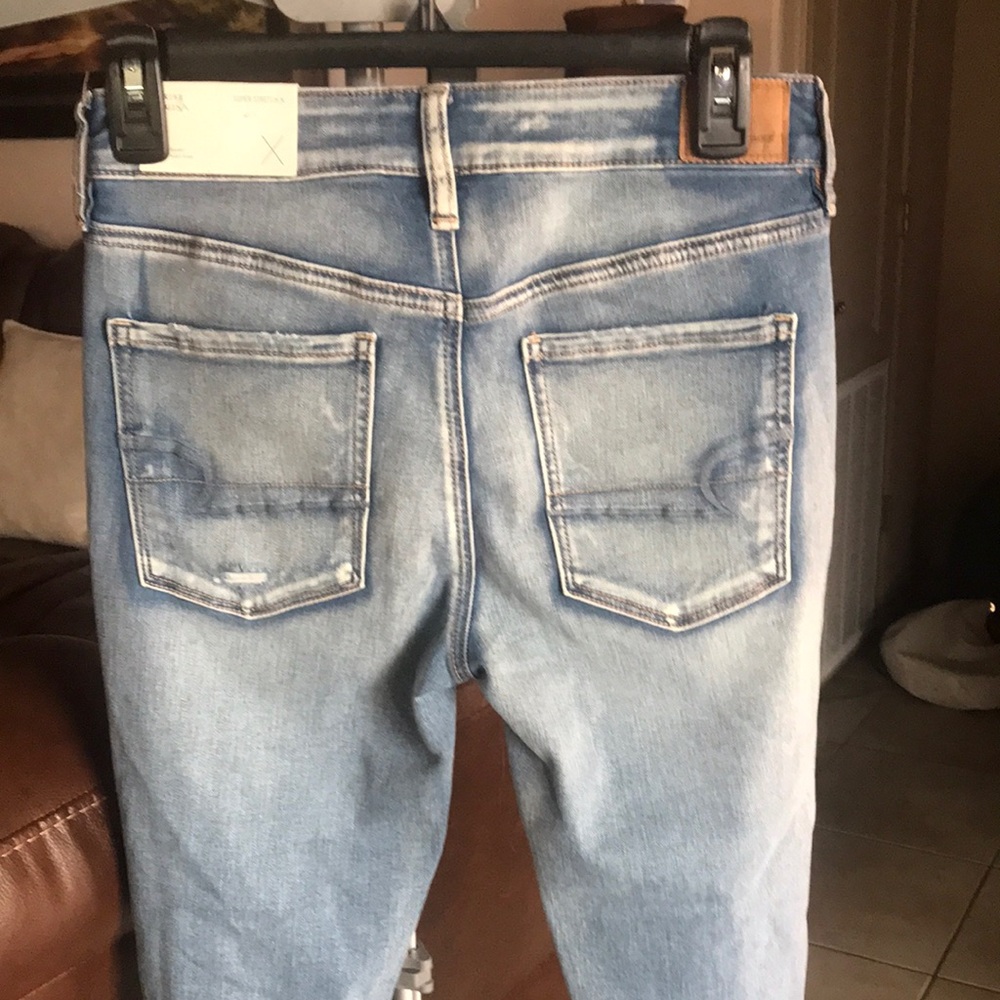 Distressed Light Blue Jeans - Picture 3 of 4
